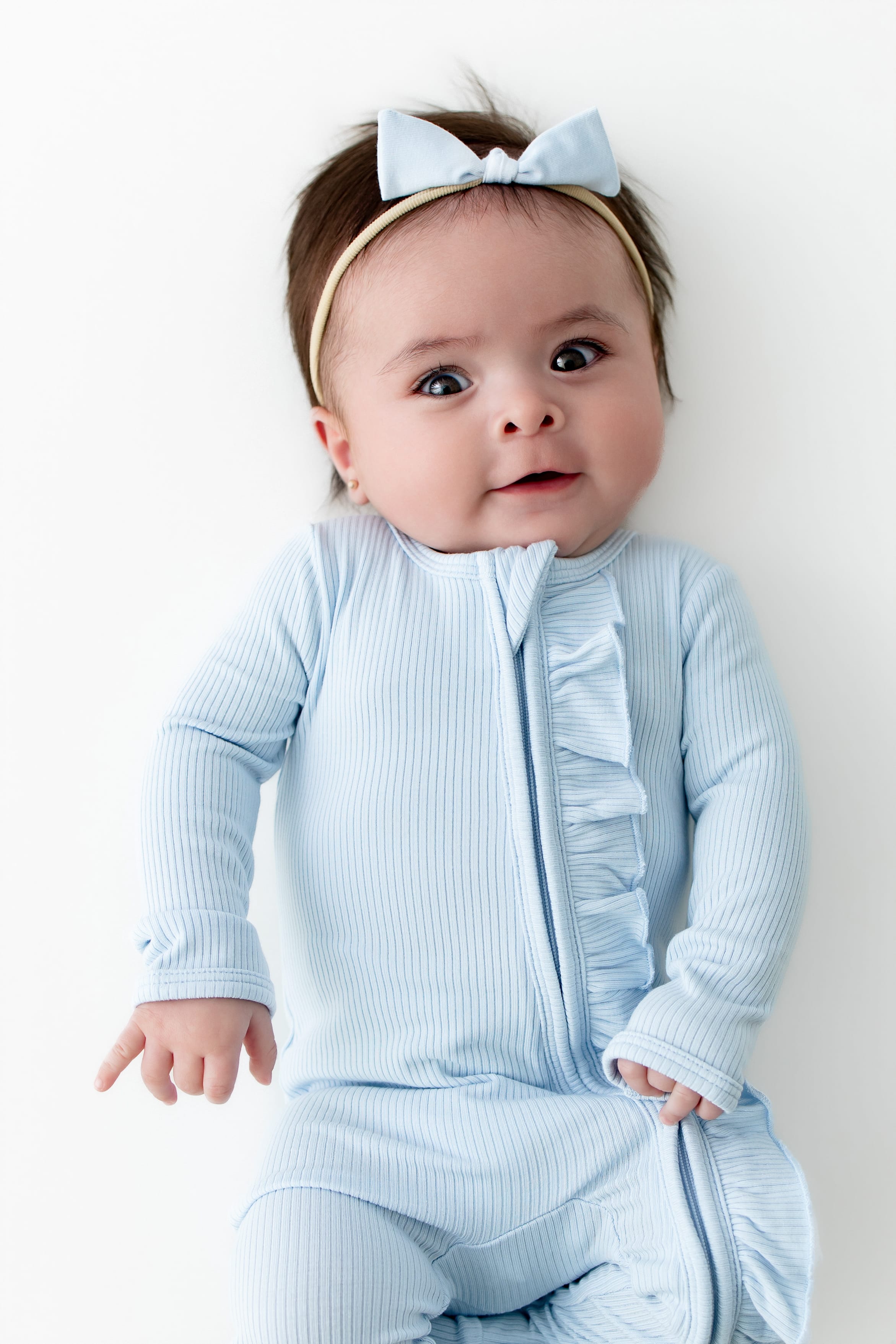 Ribbed Ruffle Zipper Footie in Breeze